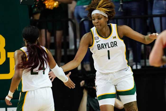Mar 6, 2022; Waco, Texas, USA; Baylor Lady Bears forward NaLyssa Smith (1) and guard Sarah Andrews (24) celebrate after a play against the Texas Tech Red Raiders during the first half at Ferrell Center. Mandatory Credit: Chris Jones-USA TODAY Sports